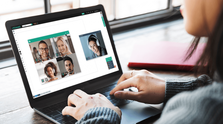 An image of laptop with opened virtual classroom with online collaborative whiteboard